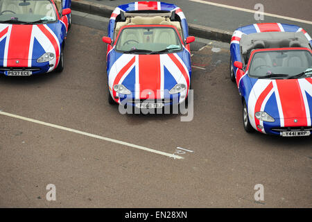 Union Jack painted Jaguars at Madeira Drive in Brighton for the 17th annual London to Brighton Jaguar run. The event sees hundreds of participants departing from Chartwell in Kent to travel to the South Coast to display their cars. Credit:  Jonny White/Alamy Live News Stock Photo