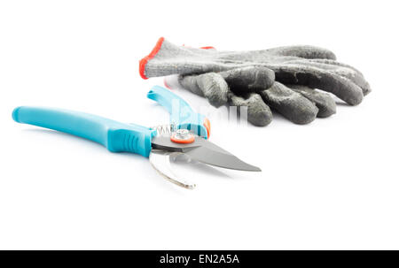 Pruning shears and worn gardening gloves isolated on white background Stock Photo