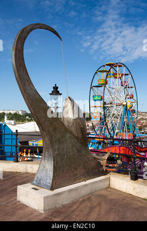 UK, England, Yorkshire, Scarborough, East Pier, Tunny Fish statue by Ray Lonsdale above Luna Park fair Stock Photo