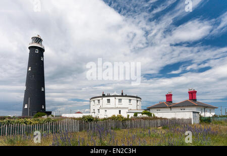 Dungeness Old Lighthouse and cottages, Dungeness, Kent, England, UK Stock Photo