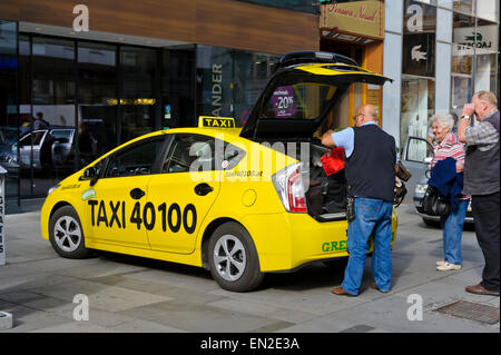 A bright coloured modern Taxi car in Vienna, Austria. Stock Photo