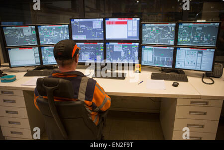 operator in a car recycling plant in holland Stock Photo