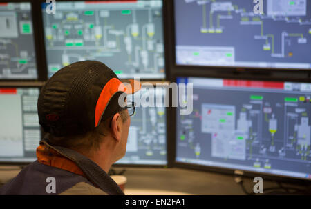 operator in a car recycling plant in holland Stock Photo
