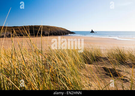 Broad Haven South beach in Pembrokeshire Wales, UK. Shot from the dunes with Church rock in the background. Stock Photo