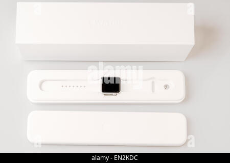 Ostfildern, Germany - April 26, 2015: Unboxing the new Apple Watch: Outer box with inner plastic case carrying the actual device Stock Photo