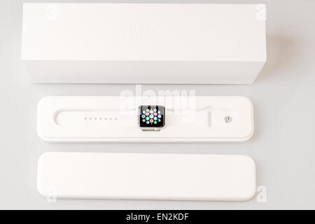 Ostfildern, Germany - April 26, 2015: Unboxing the new Apple Watch: Outer box with inner plastic case carrying the actual device Stock Photo