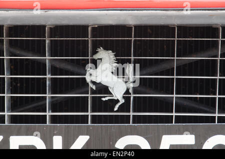 Vintage Ferrari horse emblem on engine grill,  Prancing Horse emblem Stock Photo