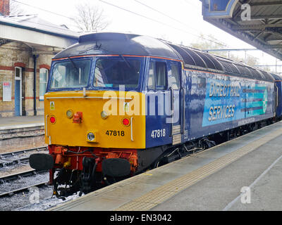 Direct Rail Services Class 47 diesel locomotive standing at Norwich Station at rear of a train for Yarmouth Stock Photo