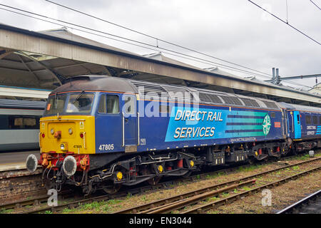 Direct Rail Services Class 47 diesel locomotive standing at Norwich Station at rear of a train for Yarmouth Stock Photo