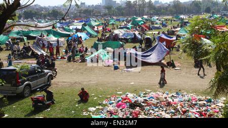 Kathmandu, Nepal. 27th Apr, 2015. People take shelter in tents after a massive earthquake at Tudikhel in Kathmandu, Nepal, April 27, 2015. A total of 3,218 people had been killed and about 6,500 others injured in the powerful earthquake that struck Nepal at midday Saturday, the authorities said Monday morning. Credit:  Sunil Sharma/Xinhua/Alamy Live News Stock Photo