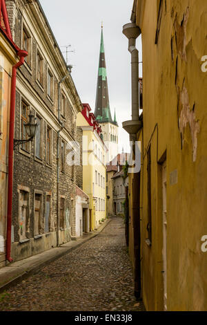 A narrow Lane, Kooli ('School Street'), leads in the direction of the 12th century Saint Olaf's church, Tallinn, Estonia. Stock Photo