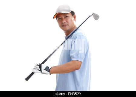 A middle-aged man with a golf club Stock Photo