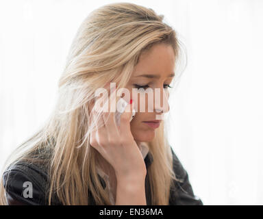 Young woman on the phone Stock Photo