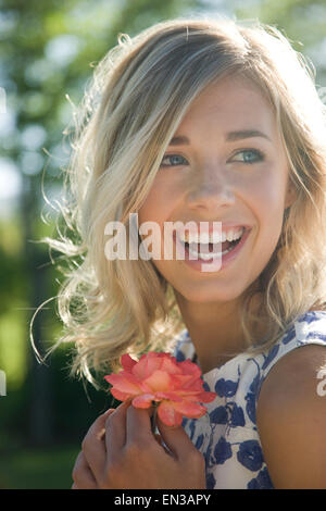 USA, Utah, Lehi, portrait of young woman in park Stock Photo