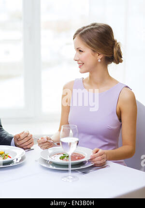 young woman looking at husband or boyfriend Stock Photo