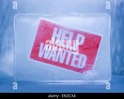 help wanted sign frozen in ice Stock Photo