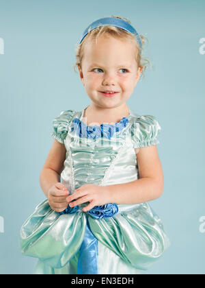 Portrait of girl (2-3) in princess costume for Halloween Stock Photo