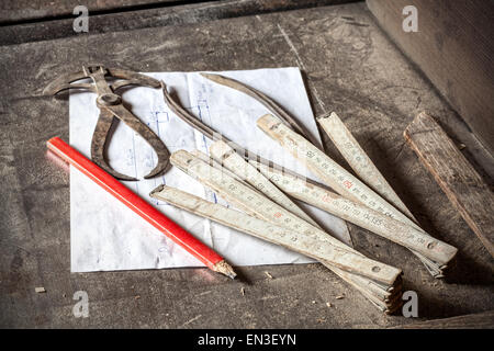 Old traditional carpenter's tools on metal table. Stock Photo