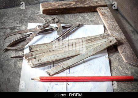 Old traditional carpenter's tools on metal table. Stock Photo