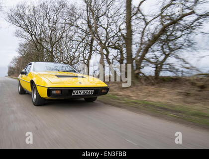 Lotus Eclat British sports speeding across the North Yorkshire Dales, England Stock Photo
