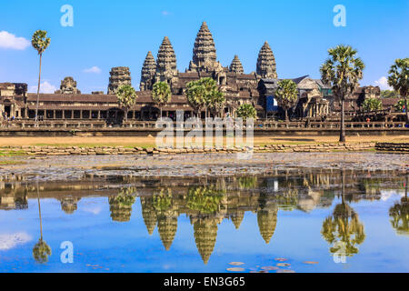 Ancient temple Angkor Wat from across the lake. The largest religious monument in the world. Siem Reap, Cambodia