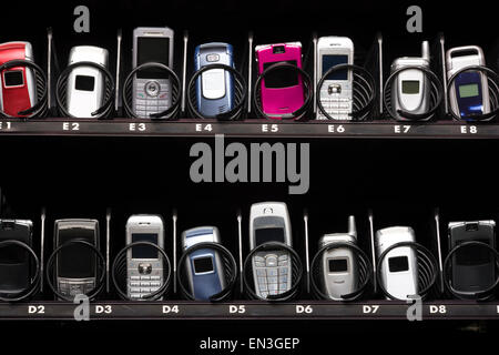 cell phones in a vending machine Stock Photo