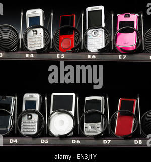 cell phones in a vending machine Stock Photo