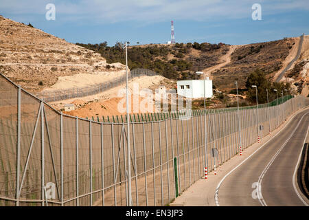 High security fences separate the Spanish exclave of Melilla, Spain from Morocco, north Africa, January 2015 Stock Photo