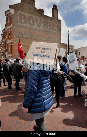 A Protestor in Windrush Square on the Reclaim Brixton march on April 25th 2015 Stock Photo