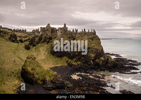 A view on an overcast day of Dunluce medieval castle, County Antrim in Northern Ireland  Credit: Euan Cherry Stock Photo