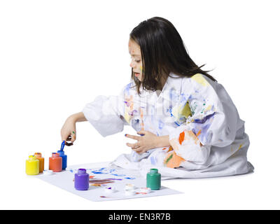 Young girl finger painting Stock Photo