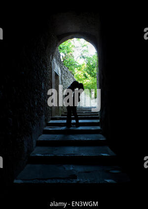 Italy, Venice, Young couple kissing in archway Stock Photo