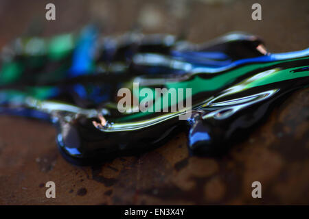 Closeup view of blue, green and black paint Stock Photo