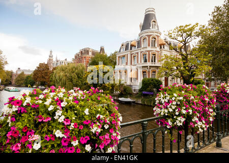 Flowers on a bridge in Amsterdam Holland The Netherlands Europe Stock Photo
