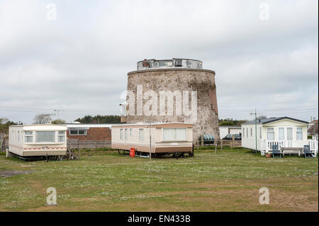 Eastbourne,  UK. 25 April 2015.An abandoned wartime Martello tower stands in the middle of a caravan park on a pleasant spring afternoon in Eastbourne on England's south coast . © Stephen Chung / Alamy Live News Stock Photo