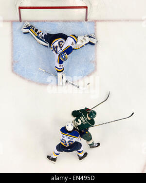 St. 20th Apr, 2015. St. Louis Blues goalie Jake Allen (34) controls the puck after a shot by Minnesota Wild center Charlie Coyle (3) during the second period of Monday's game at Xcel Energy Center in St. Paul, MN. © csm/Alamy Live News Stock Photo