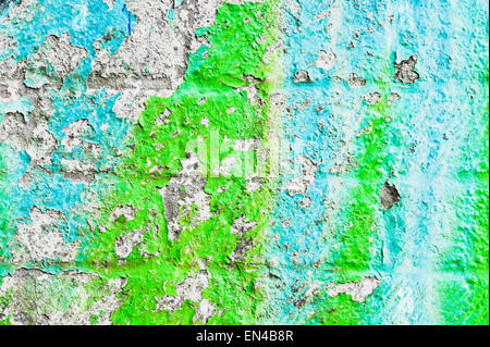 Peeling paint on a weathered brick wall Stock Photo
