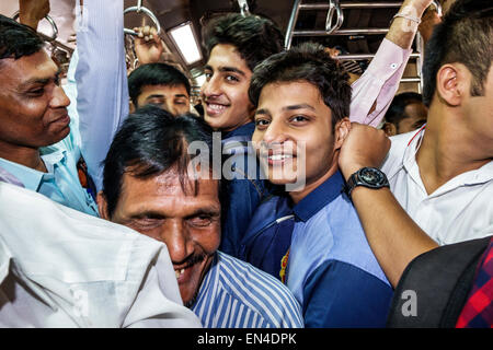 Mumbai India,Asian Andheri Railway Station,Western Line,train,commuters,riders,passenger passengers rider riders,man men male,2nd class cabin,standing Stock Photo