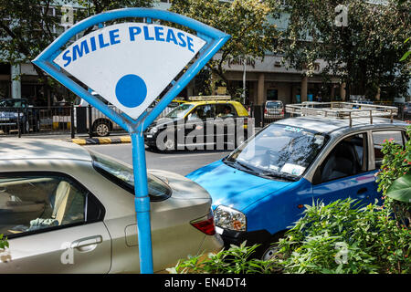Mumbai India,Churchgate,Veer Nariman Road,sign,smile please,India150226056 Stock Photo