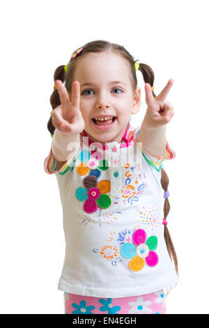 Child girl showing victory hand sign on white background Stock Photo