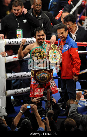 Las Vegas, Nevada, USA. 14th Nov, 2009. Manny Pacquiao (PHI) Boxing : Manny Pacquiao of Philippines celebrates his champion belts after his 12th round TKO victory over Miguel Cotto of Puerto Rico in their WBO welterweight title bout at the MGM Grand Garden Arena in Las Vegas, Nevada, USA . © Naoki Fukuda/AFLO/Alamy Live News Stock Photo