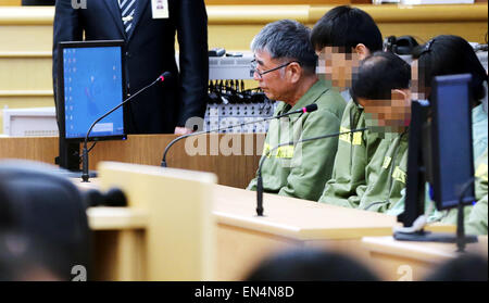 Seoul, South Korea. 28th Apr, 2015. Lee Joon-seok (4th R), captain of the South Korean sunken ferry Sewol, is seen at the Gwangju High Court in Gwangju, South Korea, April 28, 2015. The captain of the South Korean sunken ferry Sewol, which claimed lives of more than 300 passengers, most of them high school students, was sentenced to life in prison Tuesday in an appeals court ruling, reversing a lower court's judgment. Credit:  NEWSIS/Xinhua/Alamy Live News Stock Photo