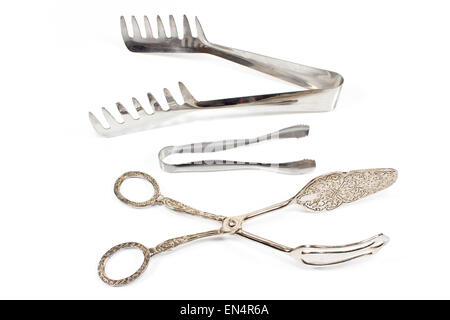 Set of various tongs isolated on a white Stock Photo