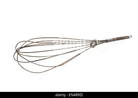 Vintage wire whisk isolated on white Stock Photo