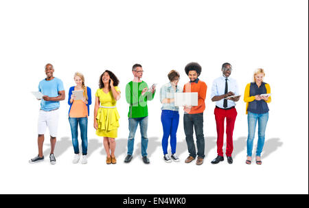 Group of Multiethnic Colorful People Using Digital Devices Stock Photo