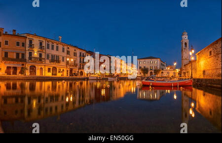 Panoramic view Port of Lazise on the lake Garda in Norther Italy. Low angle view of the port. Blue hour shot. Stock Photo