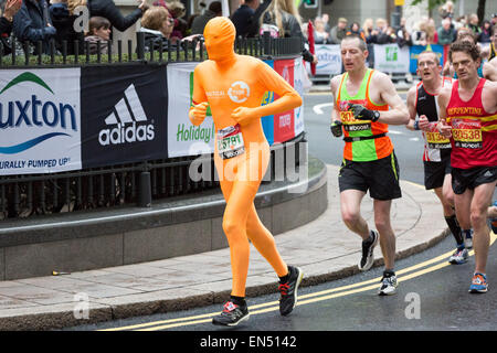 Practical Action charity runner, running at the 2015 Virgin Money London Marathon Stock Photo