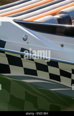Abstract checkered detail of speedboat and reflection at Poole Harbour Stock Photo
