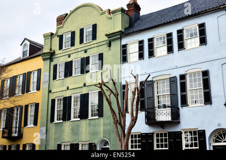 Colorful pastel building facades on Rainbow Row along East Bay Street in historic Charleston, SC. Stock Photo