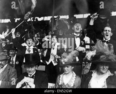 Harrovians cheer their team on during the annual Schools Day match between Eton and Harrow at Lords Cricket ground. 13th July 1914. Stock Photo